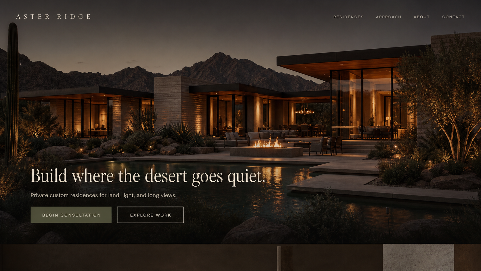 Desert residence glowing at dusk with mountains behind it
